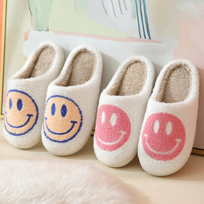 happy face slippers in yellow and pink