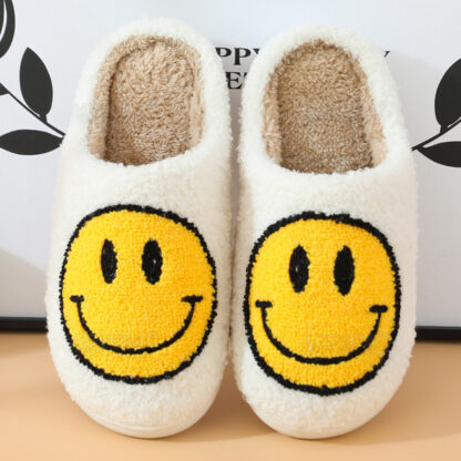 smiley face slippers in white and yellow