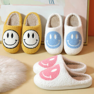 smiley face slippers yellow blue pink